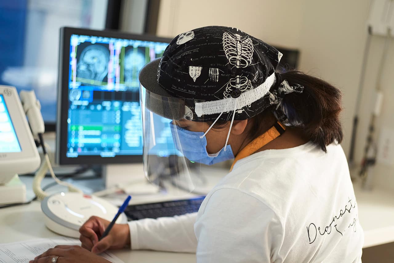 /site_files/content/annual-report/2022/connect/connect-nurse-working-xray-room.jpg